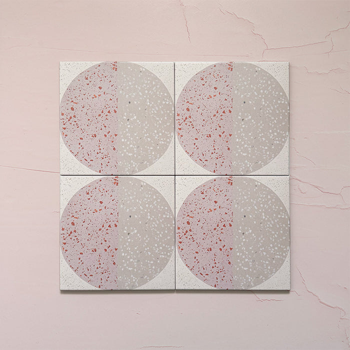 Kasuf Rose 20x20cm terrazzo-style decor tiles featuring a soft pink and neutral circular pattern with speckled terrazzo detailing, ideal for adding a playful yet elegant geometric look to contemporary interiors.