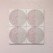 Kasuf Rose 20x20cm terrazzo-style decor tiles featuring a soft pink and neutral circular pattern with speckled terrazzo detailing, ideal for adding a playful yet elegant geometric look to contemporary interiors.