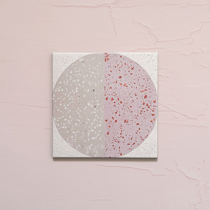 Kasuf Rose 20x20cm terrazzo-style decor tiles featuring a soft pink and neutral circular pattern with speckled terrazzo detailing, ideal for adding a playful yet elegant geometric look to contemporary interiors.