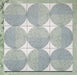 Kasuf Verde 20x20cm terrazzo-style decor tiles featuring a soft sage green and pale blue circular pattern with speckled terrazzo detailing, perfect for creating calming geometric floors and contemporary statement interiors.