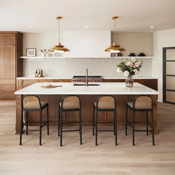 Kitchen setting featuring Atlas White Mini Brick 5x15cm gloss wall tiles, arranged in a horizontal brick pattern to create a clean, structured backdrop. The soft white tones and subtle tonal variation bring a sense of depth, while the gloss finish reflects light across the surface, enhancing brightness throughout the space.