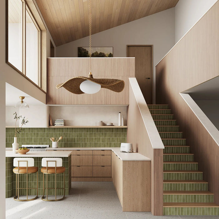 Kitchen featuring Atlas Verde Mini Brick 5x15cm matt wall tiles, installed in a vertical layout, showcasing rich green tones with a subtle textured finish, paired with wood cabinetry and a warm, contemporary interior setting.