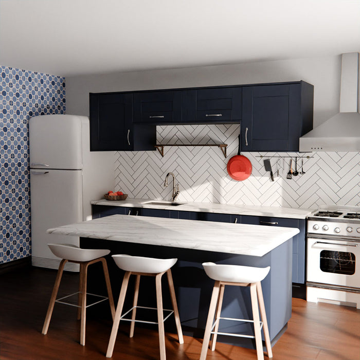 Durban gloss white handmade-effect tiles in a herringbone layout, styled as a kitchen splashback with dark cabinetry and marble worktops.
