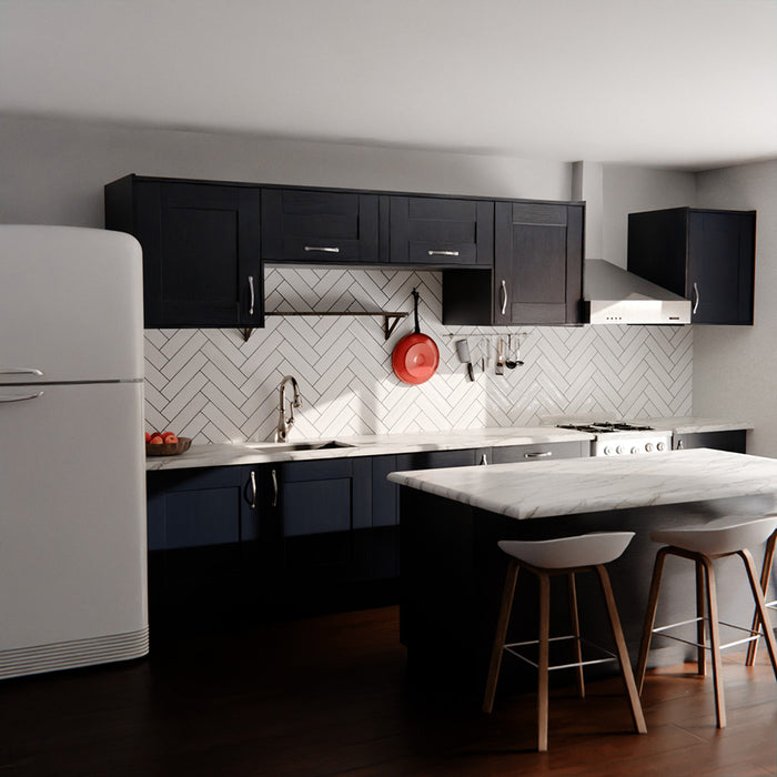 Durban gloss white handmade-effect tiles in a herringbone layout, styled as a kitchen splashback with dark cabinetry and marble worktops.