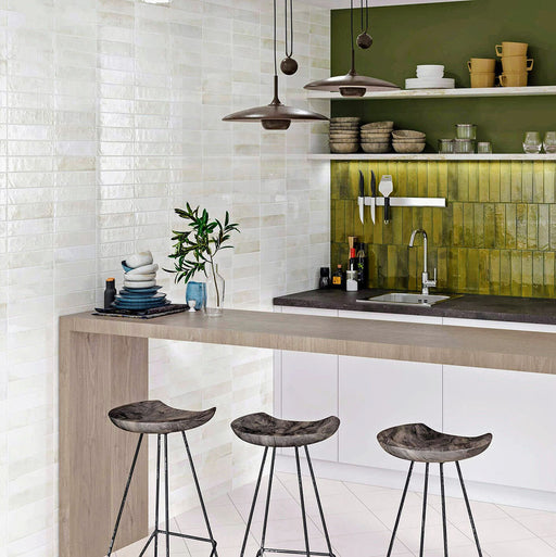 Izmir Brick Blanco Gloss Wall Tiles 6x25cm — kitchen setting showcasing the elegant, handcrafted feel of the Izmir collection. The glossy white surface reflects light beautifully, adding depth and brightness to the space, while the subtle tonal variation brings warmth and texture to modern interiors.