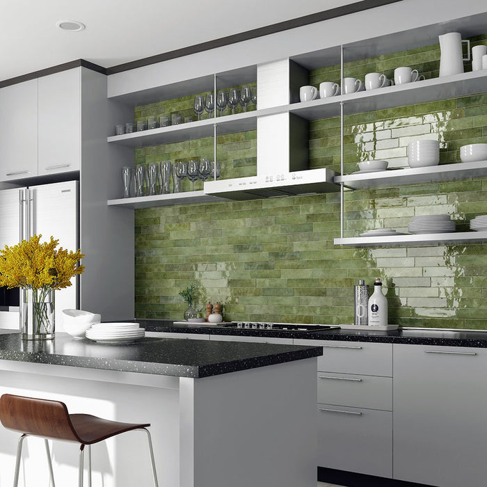 ChatGPT said:Madison Sage Green Brick Wall Tiles 6x24.6cm — kitchen setting showcasing the tile’s rich, natural tones and handcrafted shine. The glossy sage surface brings depth and warmth to the space, pairing beautifully with modern cabinetry and dark countertops for a fresh, contemporary look.