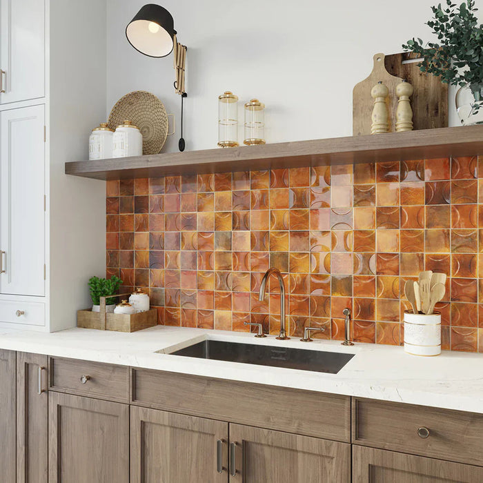 Kitchen featuring Beijing Amber Decor Square 10x10cm Moroccan-style ceramic wall tiles, styled with wooden cabinetry, gold fittings and a white marble countertop.