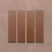 Kutani Cotto 9.1cm x 37.5cm porcelain wall and floor tile, featuring a warm terracotta-brown finish with subtle tonal variation and softly irregular edges.