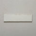 Single Kutani Vanilla 9.1cm x 37.5cm porcelain wall and floor tile, featuring a soft off-white finish with subtle tonal variation and gently irregular edges for a handcrafted look.