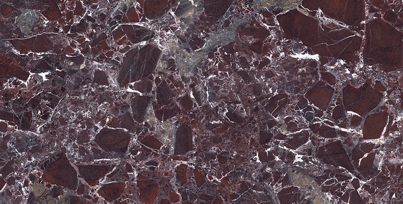 Close-up of Grand Levant Rouge Polished Marble effect 60 × 120cm porcelain tile, showcasing a deep red base with intricate white veining and subtle tonal variation, creating a bold, natural stone-inspired finish.