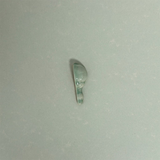 Detail view of Finchley Lime Green ceramic external corner trim with a crackle glaze finish, designed to create a smooth, decorative transition and a polished edge in classic wall tile installations.