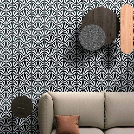 Alhambra Casa 20x20cm Moroccan tiles used in a living room setting, featuring a bold black and white fan-inspired geometric pattern that creates an elegant and dramatic statement wall behind a neutral sofa.