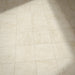 Floor setting featuring Grand Bazaar Mahal Matt Marble effect 30 × 30cm porcelain tiles, laid in a grid layout, showcasing soft beige tones, subtle veining, and a natural stone-inspired matt finish.
