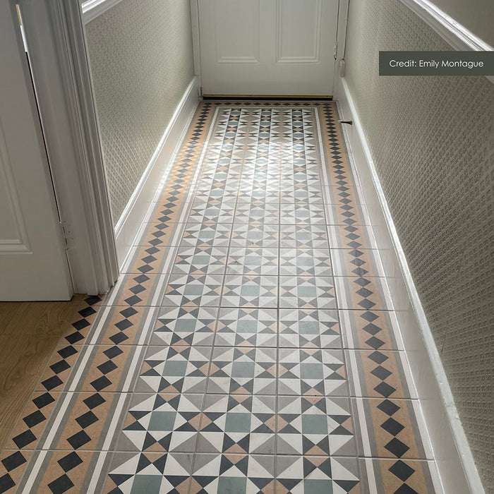 Hallway featuring Maison Brun 20x20cm Victorian-style wall and floor tiles, styled in a traditional patterned layout with decorative borders, soft neutral tones, and classic detailing for a timeless entrance interior.