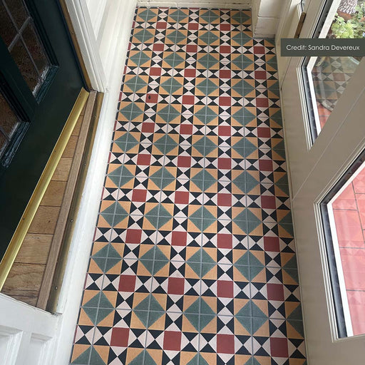 Hallway featuring Norton MINI Maison Victorian Tiles 15x15cm, showcasing a classic geometric Victorian-style floor pattern in green, terracotta, black and cream tones, installed within a traditional entranceway with period detailing.