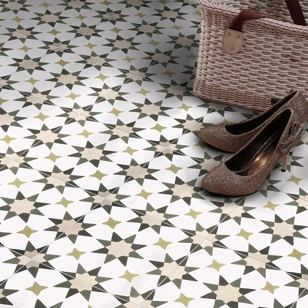 Agraba Natural 20x20cm Moroccan floor tiles in a geometric star pattern with soft beige, taupe, and olive tones, styled in an entryway with woven basket and glitter shoes for a warm, neutral look.