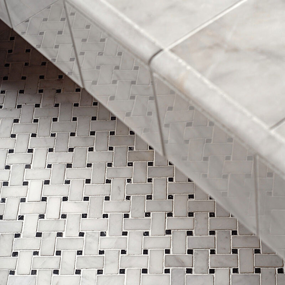 Bathroom detail featuring Fitzrovia Black & White Basketweave Mosaic 32.5x32.5cm honed natural marble tiles, showcasing a classic woven pattern with contrasting black accents, paired with white wall tiles and marble surfaces.