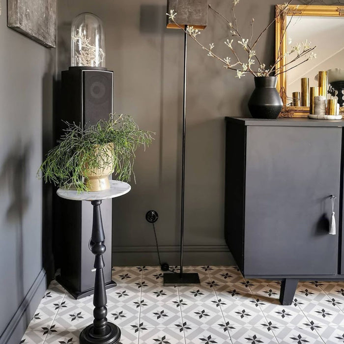 Interior marketing setting featuring Georgetown Star Victorian-style 20x20cm patterned porcelain floor tiles, styled with dark cabinetry, monochrome décor, and brass accents for a classic yet contemporary look.