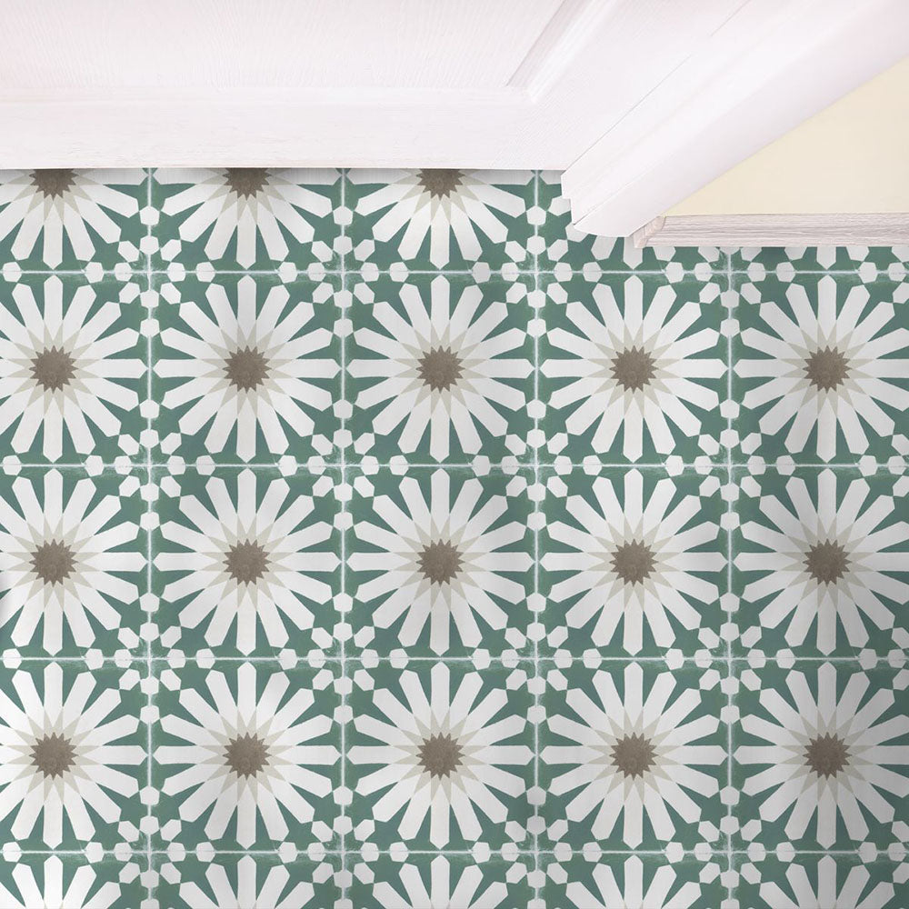 Marketing setting featuring Soukaina Green B Moroccan-style 20cm x 20cm patterned porcelain wall tiles, showcasing a repeating geometric star design in soft green, white and warm neutral tones with a matt finish.