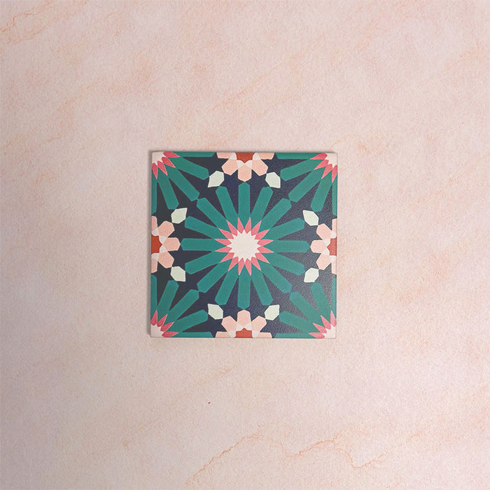 Single Fizaan Festive Blue Mini 15x15cm Moroccan-style porcelain tile featuring an intricate geometric pattern in deep blue, green and soft neutral tones.