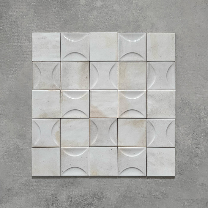 Mixed layout of Beijing White 10x10cm Moroccan square tiles and Beijing White Décor tiles, featuring a blend of smooth and raised crescent textures with soft glaze variation for a handcrafted, artisanal finish.