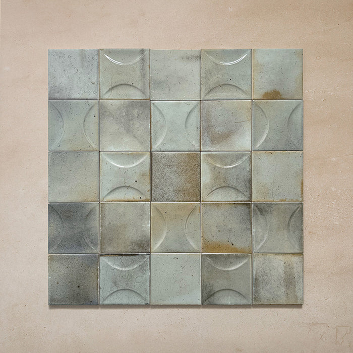 Beijing Celadon Green Square 10x10cm Moroccan-style ceramic wall tiles mixed with Celadon Green Decor Square tiles, styled in a grouped layout to highlight their subtle 3D texture and tonal variation.