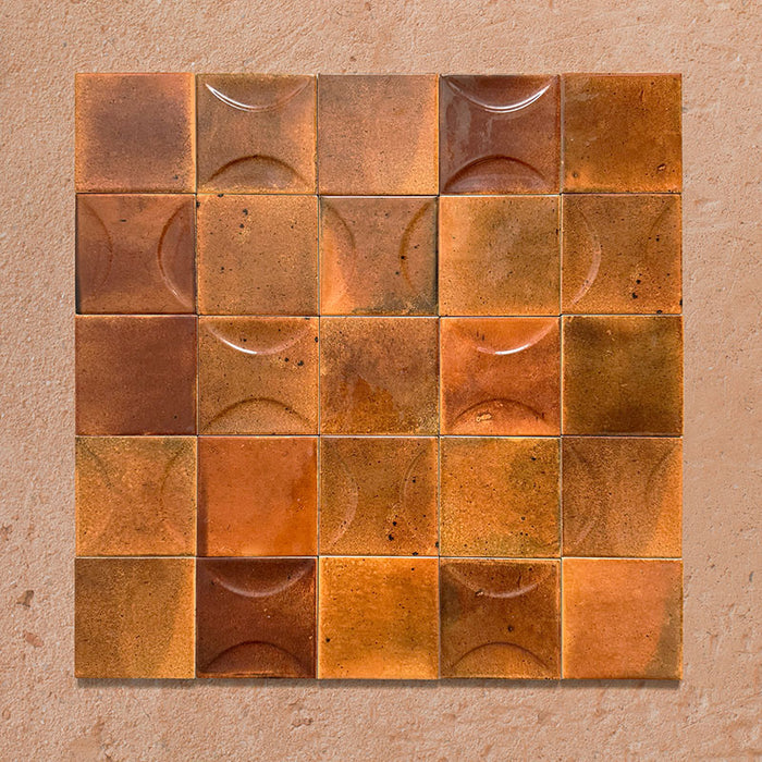 Beijing Amber Square 10x10cm Moroccan-style ceramic wall tiles mixed with Beijing Amber Decor Square tiles, styled in a grouped layout to highlight their curved relief design and rich amber glaze.