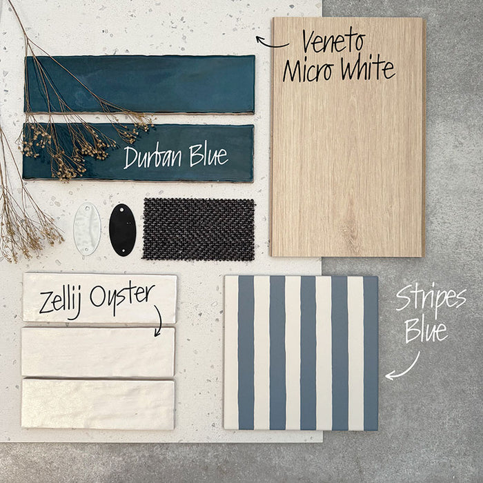 Interior tile moodboard featuring Zellij Oyster Brick Moroccan-style tiles in a 6.5cm x 20cm brick format, combined with deep blue ceramic tiles, striped patterned tiles, and light wood textures to illustrate a fresh, coastal-inspired colour palette.