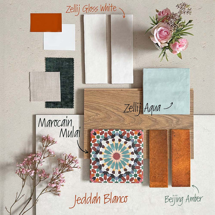 Interior tile moodboard featuring Zellij White Gloss Brick Moroccan-style tiles in a 6.5cm x 20cm format, styled with aqua and terracotta tones, patterned Moroccan tiles, soft textiles, and natural wood textures to create a warm, character-filled interior palette.