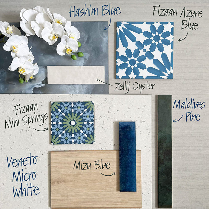 Interior tile moodboard featuring Zellij Oyster Brick Moroccan-style tiles in a 6.5cm x 20cm format, paired with blue patterned tiles, terrazzo-effect surfaces, and natural textures to showcase a calm, contemporary colour palette.