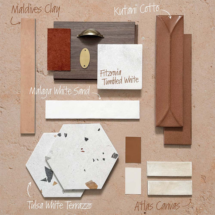Flat lay moodboard featuring Fitzrovia White 15.2x15.2cm tumbled natural marble tile with warm clay tones, textured surfaces, terrazzo tiles, and brass accents, showcasing cohesive material pairing ideas for a soft, earthy interior scheme.