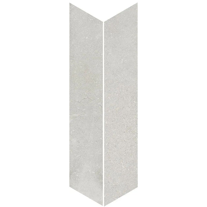 Product display of Obsidian Stone Chevron Silver 10x53cm stone-effect porcelain chevron tiles in soft silver-grey tones, featuring subtle veining, textured detailing and a realistic natural stone appearance with a matt finish.