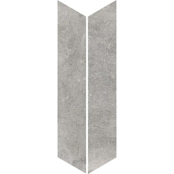 Product display of Obsidian Stone Chevron Titanium 10x53cm stone-effect porcelain chevron tiles in mid-grey tones, featuring subtle veining, textured detailing and a realistic natural stone appearance with a matt finish.