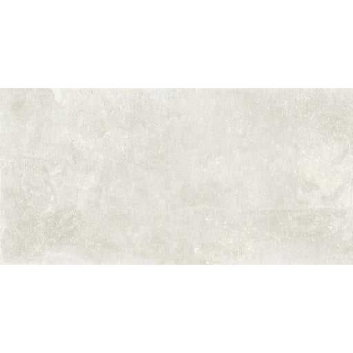 Product display of Obsidian Stone Silk 30x60cm stone-effect porcelain tiles in soft light grey tones, featuring subtle texture, gentle tonal variation and a realistic natural stone appearance with a matt finish.