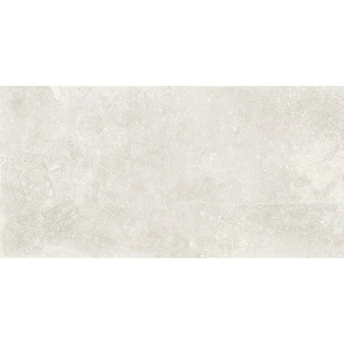 Product display of Obsidian Stone Silk 30x60cm stone-effect porcelain tiles in soft light grey tones, featuring subtle texture, gentle tonal variation and a realistic natural stone appearance with a matt finish.