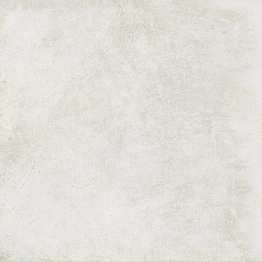 Product display of Obsidian Stone Silk 60x60cm stone-effect porcelain tiles in soft light grey tones, featuring subtle texture, gentle tonal variation and a realistic natural stone appearance with a matt finish.