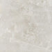 Product display of Obsidian Stone Silver 60x60cm stone-effect porcelain tiles in soft silver-grey tones, featuring subtle veining, textured detailing and a realistic natural stone appearance with a matt finish.