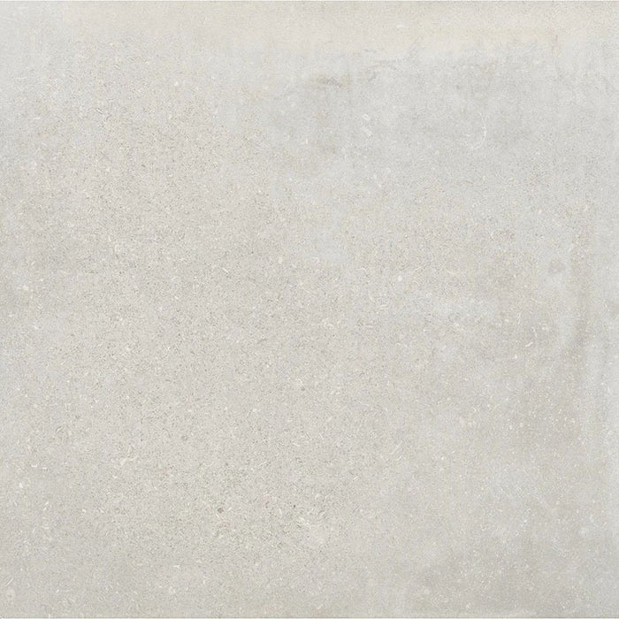 Product display of Obsidian Stone Silver 60x60cm stone-effect porcelain tiles in soft silver-grey tones, featuring subtle veining, textured detailing and a realistic natural stone appearance with a matt finish.