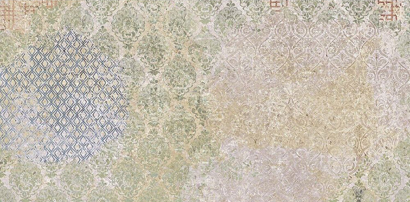 Boheme Ocean Blend 2cm 50 × 100cm patterned porcelain slab featuring a soft mix of blue, sage and beige tones with layered, aged-effect detailing. Subtle decorative motifs create a relaxed, characterful look ideal for outdoor spaces.