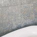 Close-up of Boheme Ocean Blue 60 × 60cm patterned tiles, featuring layered blue and neutral tones with a softly worn, decorative effect. Ideal for adding texture and character to bathroom walls, floors, or statement feature areas.