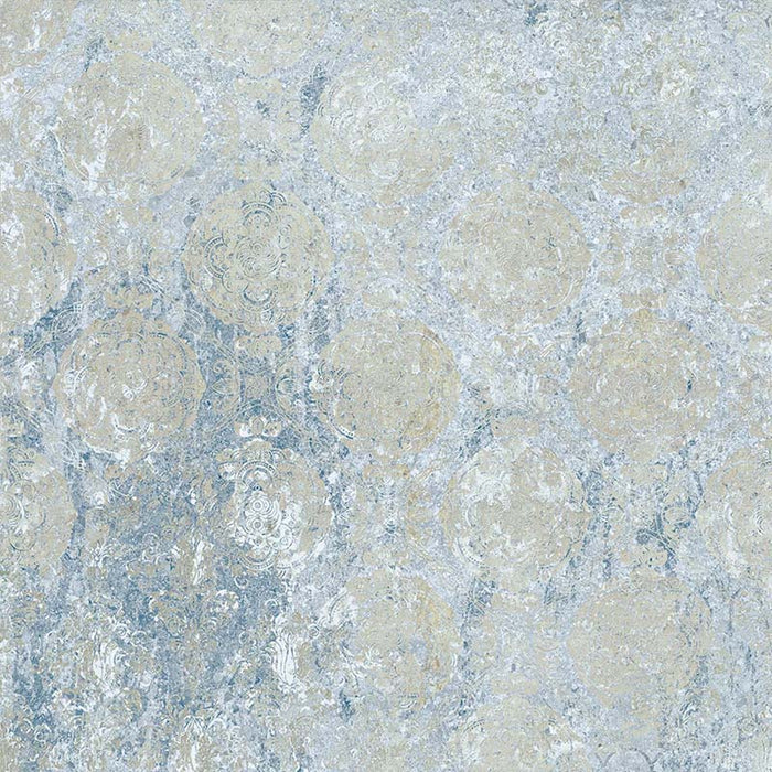 Flat lay of Boheme Ocean Blue 60 × 60cm patterned tiles, featuring layered blue and soft neutral tones with a distressed, decorative effect. Ideal for creating characterful floors or statement walls in both modern and relaxed interiors.