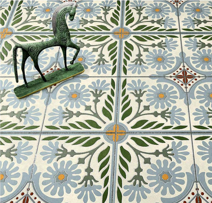 Close-up of Palma Olbia 2cm patterned outdoor slabs 50 × 100cm, featuring a faded Mediterranean-inspired floral design in soft green, blue, and terracotta tones with a decorative vintage-style finish.
