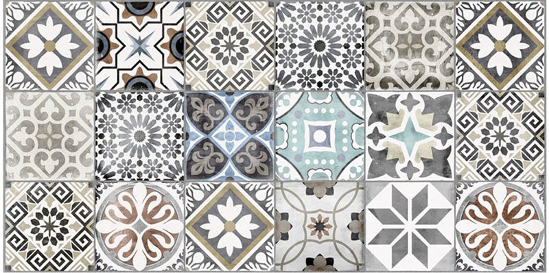 Close-up of Palma Patchwork 2cm patterned outdoor slabs 50 × 100cm, featuring a decorative patchwork-inspired mix of geometric and floral patterns in soft blue, grey, beige, cream, and terracotta tones.