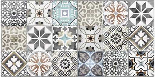 Close-up of Palma Patchwork 2cm patterned outdoor slabs 50 × 100cm, featuring a decorative patchwork-inspired mix of geometric and floral patterns in soft blue, grey, beige, cream, and terracotta tones.