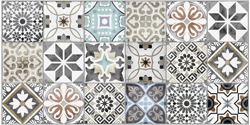 Close-up of Palma Patchwork 2cm patterned outdoor slabs 50 × 100cm, featuring a decorative patchwork-inspired mix of geometric and floral patterns in soft blue, grey, beige, cream, and terracotta tones.