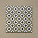 Four-tile layout of Carnaby Park Road Victorian-style 20x20cm porcelain wall and floor tiles, highlighting the repeating olive, white, and black diamond geometric pattern.