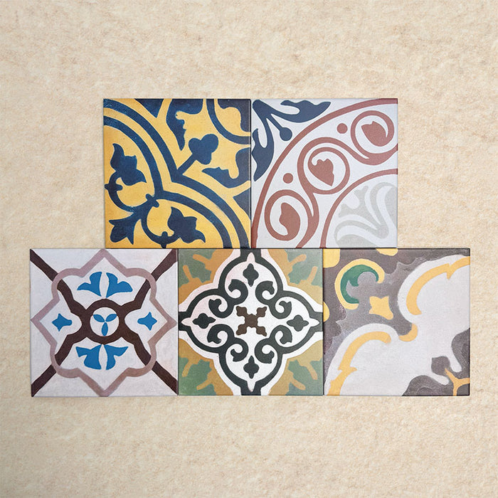 Fihrdos Patchwork Moroccan-style 20x20cm patterned porcelain tiles arranged in a mini group, highlighting a selection of colourful geometric and traditional decorative designs.