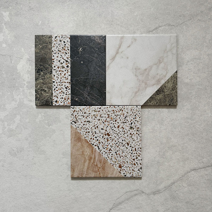 Flatlay featuring Dino Terrazzo Blanco Decor 20x20cm terrazzo-style ceramic tiles, showing a group of patchwork designs with mixed geometric patterns in white, terracotta, green, and black tones.