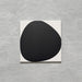 Pebble Beach Reversed Black 20x20cm patterned tiles featuring a bold black organic circular design, ideal for creating striking monochrome floors and statement walls with a contemporary geometric aesthetic.