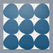 Pebble Beach Reversed Blue 20x20cm patterned tiles featuring a bold deep blue organic circular design, ideal for creating playful statement walls and contemporary patterned floors with a modern geometric feel.